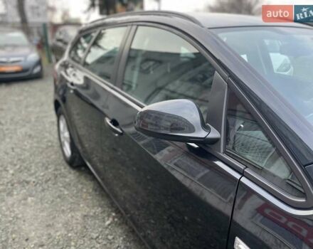 Черный Опель Астра, объемом двигателя 1.5 л и пробегом 197 тыс. км за 9400 $, фото 23 на Automoto.ua