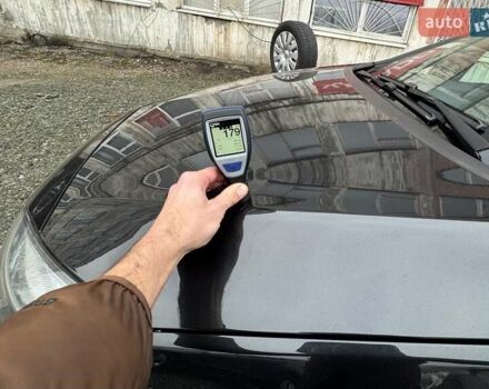 Черный Опель Астра, объемом двигателя 1.5 л и пробегом 197 тыс. км за 9400 $, фото 77 на Automoto.ua