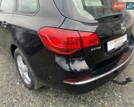 Черный Опель Астра, объемом двигателя 1.5 л и пробегом 197 тыс. км за 9400 $, фото 14 на Automoto.ua