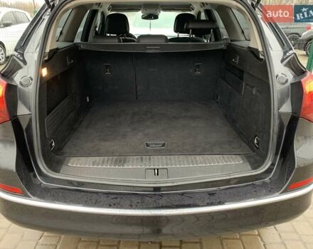 Черный Опель Астра, объемом двигателя 1.7 л и пробегом 326 тыс. км за 8655 $, фото 27 на Automoto.ua