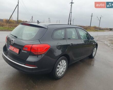 Черный Опель Астра, объемом двигателя 1.6 л и пробегом 251 тыс. км за 7600 $, фото 4 на Automoto.ua