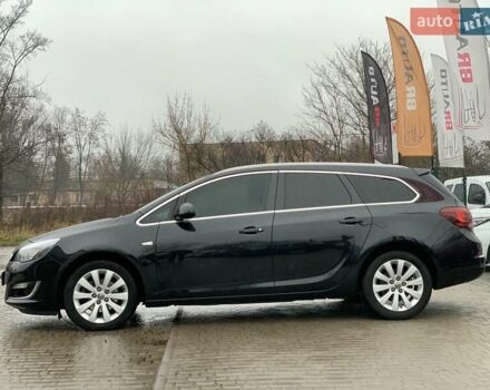 Черный Опель Астра, объемом двигателя 1.7 л и пробегом 326 тыс. км за 8655 $, фото 11 на Automoto.ua