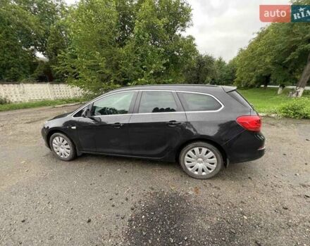Черный Опель Астра, объемом двигателя 1.6 л и пробегом 220 тыс. км за 8200 $, фото 8 на Automoto.ua