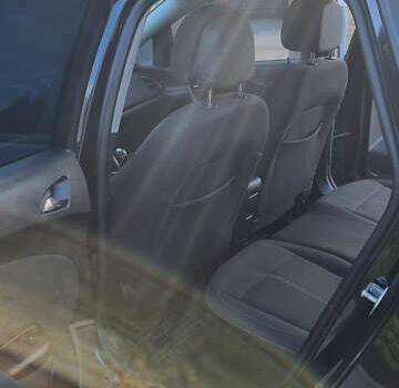 Черный Опель Астра, объемом двигателя 1.6 л и пробегом 235 тыс. км за 7700 $, фото 3 на Automoto.ua