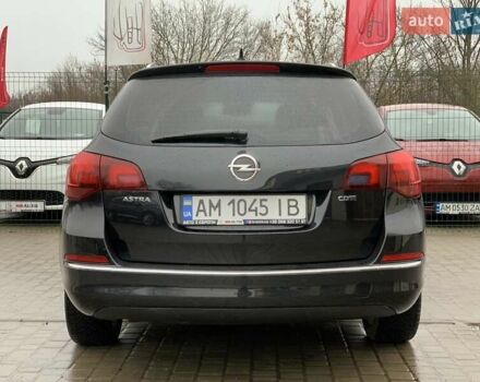 Черный Опель Астра, объемом двигателя 1.7 л и пробегом 326 тыс. км за 8655 $, фото 15 на Automoto.ua
