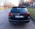 Черный Опель Астра, объемом двигателя 1.6 л и пробегом 187 тыс. км за 8700 $, фото 1 на Automoto.ua