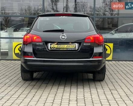 Черный Опель Астра, объемом двигателя 1.6 л и пробегом 145 тыс. км за 9600 $, фото 5 на Automoto.ua