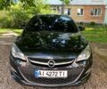 Черный Опель Астра, объемом двигателя 1.6 л и пробегом 290 тыс. км за 8250 $, фото 1 на Automoto.ua