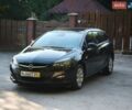 Черный Опель Астра, объемом двигателя 1.6 л и пробегом 220 тыс. км за 7900 $, фото 1 на Automoto.ua