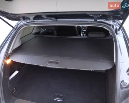 Чорний Опель Астра, об'ємом двигуна 1.6 л та пробігом 200 тис. км за 8599 $, фото 2 на Automoto.ua