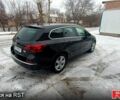Черный Опель Астра, объемом двигателя 1.6 л и пробегом 205 тыс. км за 11700 $, фото 3 на Automoto.ua