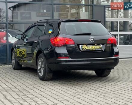 Черный Опель Астра, объемом двигателя 1.6 л и пробегом 145 тыс. км за 9600 $, фото 4 на Automoto.ua