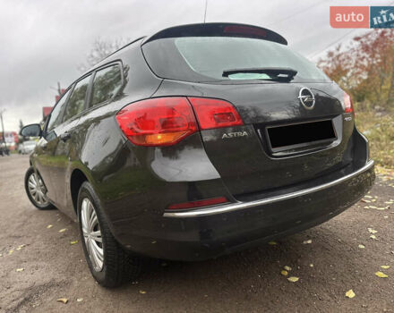 Черный Опель Астра, объемом двигателя 1.6 л и пробегом 205 тыс. км за 8290 $, фото 5 на Automoto.ua
