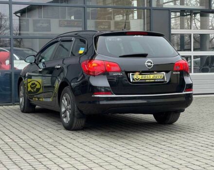 Черный Опель Астра, объемом двигателя 1.6 л и пробегом 145 тыс. км за 9600 $, фото 4 на Automoto.ua