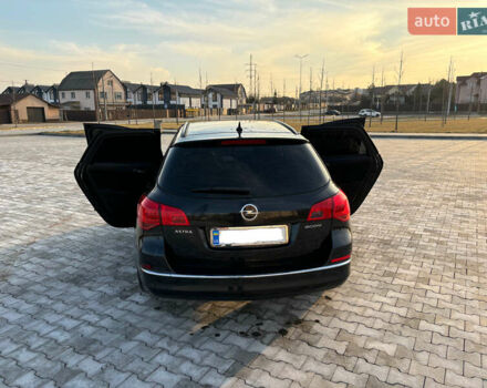 Черный Опель Астра, объемом двигателя 1.6 л и пробегом 290 тыс. км за 8700 $, фото 2 на Automoto.ua