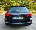 Черный Опель Астра, объемом двигателя 1.6 л и пробегом 220 тыс. км за 7900 $, фото 2 на Automoto.ua