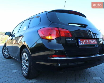 Черный Опель Астра, объемом двигателя 1.6 л и пробегом 205 тыс. км за 7790 $, фото 6 на Automoto.ua