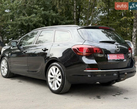 Черный Опель Астра, объемом двигателя 1.6 л и пробегом 243 тыс. км за 10350 $, фото 7 на Automoto.ua