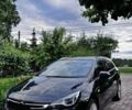 Черный Опель Астра, объемом двигателя 1.6 л и пробегом 224 тыс. км за 12000 $, фото 1 на Automoto.ua