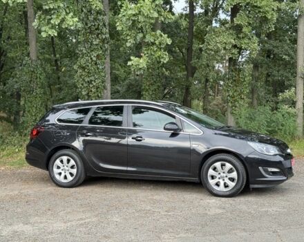 Черный Опель Астра, объемом двигателя 1.6 л и пробегом 156 тыс. км за 9300 $, фото 2 на Automoto.ua