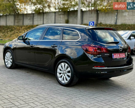 Черный Опель Астра, объемом двигателя 1.6 л и пробегом 220 тыс. км за 9900 $, фото 6 на Automoto.ua
