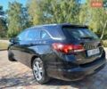 Чорний Опель Астра, об'ємом двигуна 1.6 л та пробігом 239 тис. км за 9800 $, фото 5 на Automoto.ua
