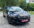 Черный Опель Астра, объемом двигателя 1.6 л и пробегом 238 тыс. км за 10500 $, фото 1 на Automoto.ua
