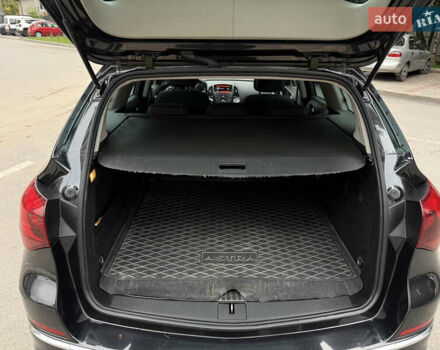 Черный Опель Астра, объемом двигателя 1.6 л и пробегом 243 тыс. км за 10350 $, фото 44 на Automoto.ua