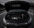 Чорний Опель Астра, об'ємом двигуна 0 л та пробігом 218 тис. км за 9550 $, фото 5 на Automoto.ua