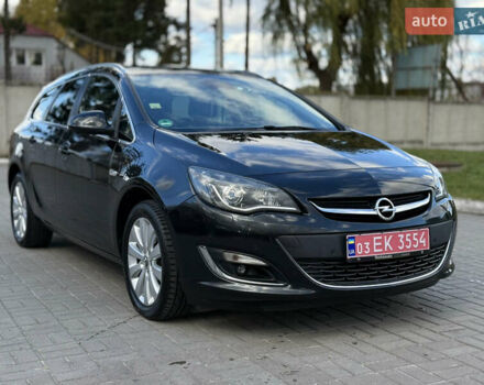 Черный Опель Астра, объемом двигателя 1.6 л и пробегом 220 тыс. км за 9900 $, фото 1 на Automoto.ua