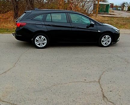 Черный Опель Астра, объемом двигателя 1.6 л и пробегом 185 тыс. км за 13000 $, фото 12 на Automoto.ua