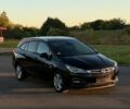 Черный Опель Астра, объемом двигателя 1.6 л и пробегом 128 тыс. км за 11299 $, фото 1 на Automoto.ua