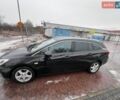 Черный Опель Астра, объемом двигателя 1.6 л и пробегом 223 тыс. км за 10000 $, фото 1 на Automoto.ua