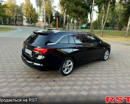 Черный Опель Астра, объемом двигателя 1.6 л и пробегом 238 тыс. км за 10900 $, фото 4 на Automoto.ua