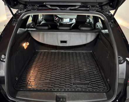 Черный Опель Астра, объемом двигателя 1.6 л и пробегом 195 тыс. км за 11990 $, фото 4 на Automoto.ua