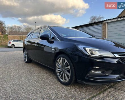 Черный Опель Астра, объемом двигателя 1.6 л и пробегом 142 тыс. км за 12000 $, фото 1 на Automoto.ua