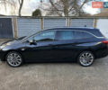 Черный Опель Астра, объемом двигателя 1.6 л и пробегом 142 тыс. км за 12000 $, фото 7 на Automoto.ua
