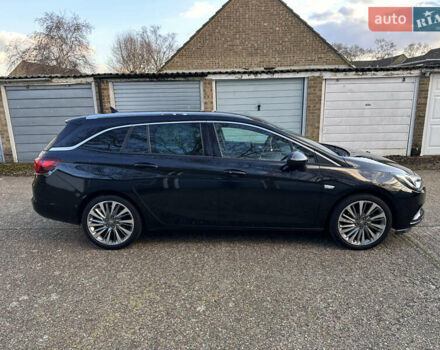 Черный Опель Астра, объемом двигателя 1.6 л и пробегом 142 тыс. км за 12000 $, фото 3 на Automoto.ua