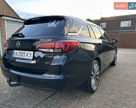 Черный Опель Астра, объемом двигателя 1.6 л и пробегом 142 тыс. км за 12000 $, фото 4 на Automoto.ua