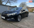 Черный Опель Астра, объемом двигателя 1.6 л и пробегом 142 тыс. км за 12000 $, фото 1 на Automoto.ua