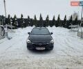 Черный Опель Астра, объемом двигателя 1.6 л и пробегом 208 тыс. км за 11500 $, фото 1 на Automoto.ua