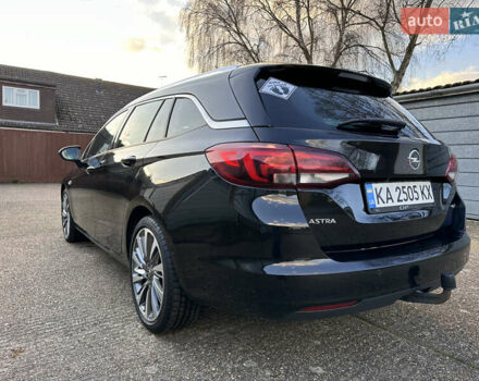 Черный Опель Астра, объемом двигателя 1.6 л и пробегом 142 тыс. км за 12000 $, фото 6 на Automoto.ua