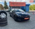Чорний Опель Астра, об'ємом двигуна 1.5 л та пробігом 164 тис. км за 11900 $, фото 1 на Automoto.ua