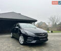 Чорний Опель Астра, об'ємом двигуна 1.5 л та пробігом 104 тис. км за 13699 $, фото 1 на Automoto.ua