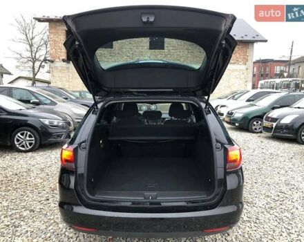 Черный Опель Астра, объемом двигателя 1.5 л и пробегом 172 тыс. км за 11499 $, фото 21 на Automoto.ua