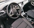 Черный Опель Астра, объемом двигателя 1.5 л и пробегом 172 тыс. км за 11800 $, фото 6 на Automoto.ua