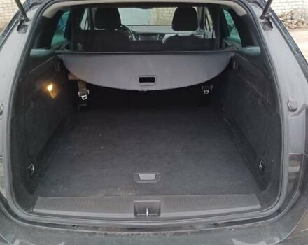 Чорний Опель Астра, об'ємом двигуна 1.5 л та пробігом 132 тис. км за 13100 $, фото 6 на Automoto.ua