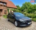 Чорний Опель Астра, об'ємом двигуна 1.5 л та пробігом 156 тис. км за 11899 $, фото 1 на Automoto.ua