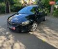 Чорний Опель Астра, об'ємом двигуна 1.5 л та пробігом 135 тис. км за 14290 $, фото 1 на Automoto.ua