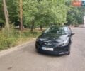 Чорний Опель Астра, об'ємом двигуна 1.5 л та пробігом 213 тис. км за 13600 $, фото 1 на Automoto.ua